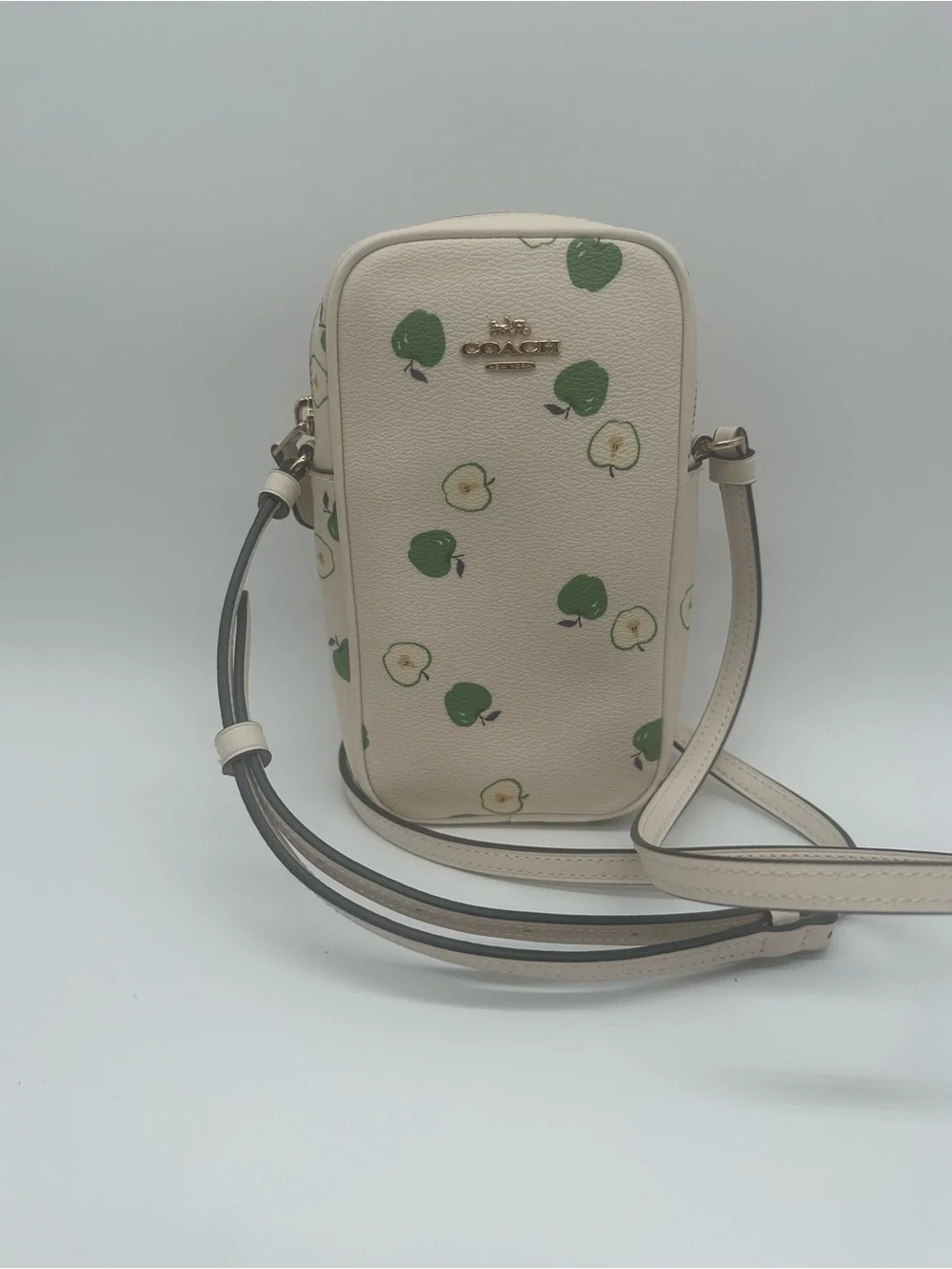 Coach Cream Crossbody Phone Pouch with Green Apple Motif